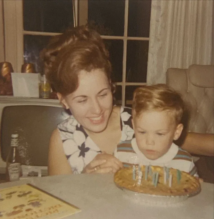 Nate Walters as a young boy with his mother, Sheila, at a birthday celebration in 1971
